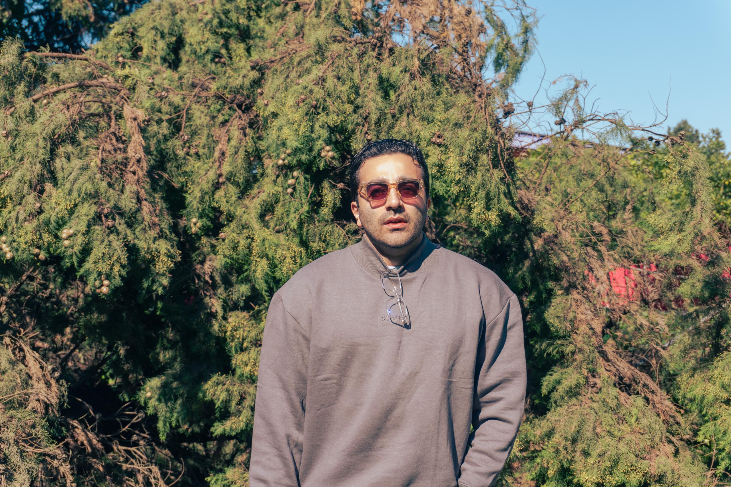 Amir Hatami working in filmmaking and editing.